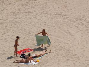 Spying Girls Topless On Beach-m7cllre205.jpg