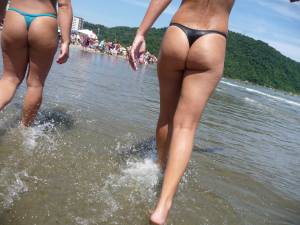 Redhead & Blonde on the Beach with Perfect Thong Asses-h7cuw3kvm2.jpg