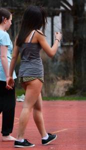 Girl with really short shorts exposes her assb7de4432jw.jpg