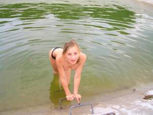 Young-Teen-Posing-At-The-Storage-Lake-w7d6g7dd31.jpg