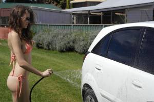 Amateur girl wetting and soaping hooters while washing car on la [x250]e7e0sehxd0.jpg