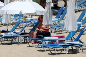 Large-redhead-woman-in-bikini-in-Agia-Anna-beach%2C-Naxos-g7e4pvc45y.jpg