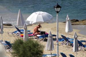 Large redhead woman in bikini in Agia Anna beach, Naxos-07e4pw537g.jpg