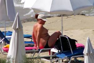 Large redhead woman in bikini in Agia Anna beach, Naxos-y7e4pwrp7j.jpg