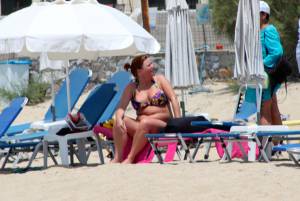 Large redhead woman in bikini in Agia Anna beach, Naxos-u7e4pvohmn.jpg