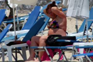 Large-redhead-woman-in-bikini-in-Agia-Anna-beach%2C-Naxos-w7e4pvlcrq.jpg