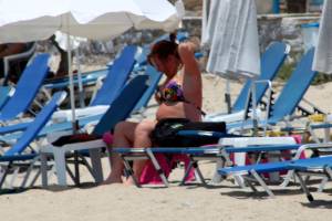 Large redhead woman in bikini in Agia Anna beach, Naxos-77e4pvk0og.jpg