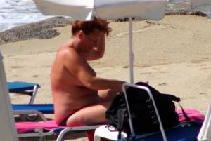 Large redhead woman in bikini in Agia Anna beach, Naxos-t7e4pwkumz.jpg