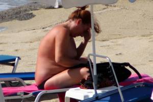 Large redhead woman in bikini in Agia Anna beach, Naxos-l7e4pw61lw.jpg