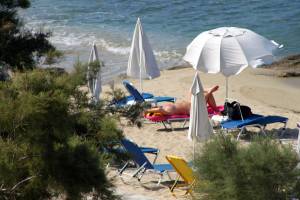 Large-redhead-woman-in-bikini-in-Agia-Anna-beach%2C-Naxos-k7e4pw111o.jpg