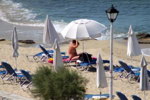 Large redhead woman in bikini in Agia Anna beach, Naxosl7e4pwnktv.jpg